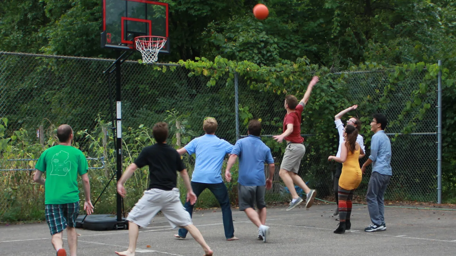 students playing basketball