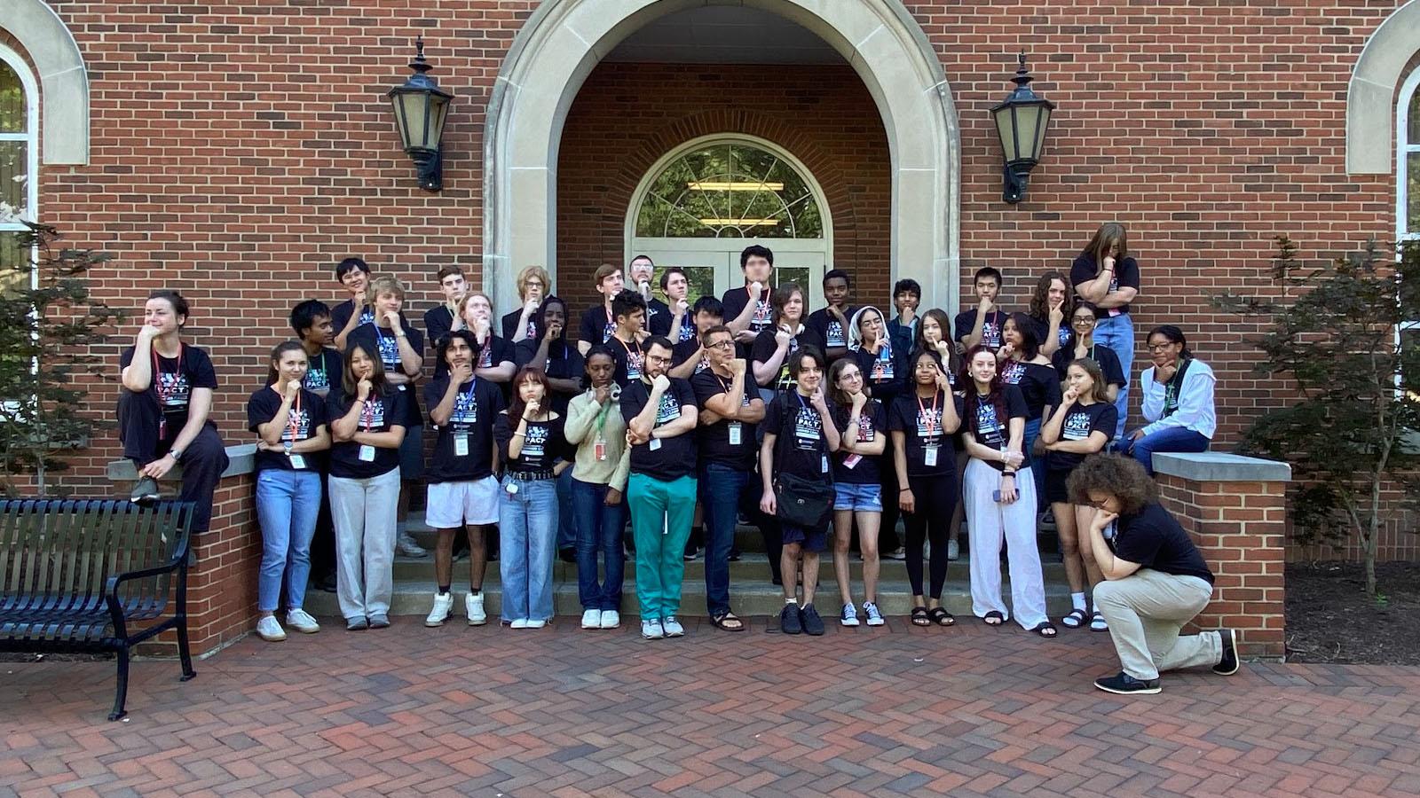 2024 campers standing outside of University Hall